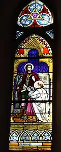 Stained glass window of Sts. Sebastianus and Chromatius.