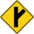 Skewed side road junction on right