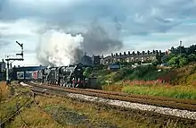 A steam locomotive on its route