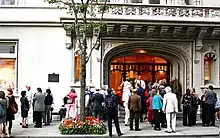 A group of people gather outside the Jewish Museum in New York during the 2011 Museum Mile Festival.