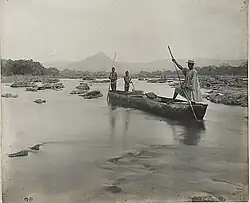 Canoemen on boat in Volta river above Akuse. From The National Archives UK, 1890's