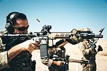 One of the 3rd SFG(A) operators used an URG-I variant M4A1 carbine with a black Magpul STANAG magazine during training at Marine Corps Air Ground Combat Center, Twentynine Palms, California in 2019.