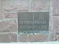 The international boundary plaque on the bridge