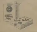 A package of Sapèque d'Or cigarettes featuring the design of a cash coin with the inscription Kim Tiền Yên Thảo (金錢煙草).