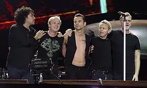 Depeche Mode performing in 2006. From left to right:Peter Gordeno, Christian Eigner, Dave Gahan, Martin Gore and Andy Fletcher