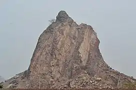 Tilla Chenab between Rabwah and the Chenab River. This rock is being cut and sold in pieces.