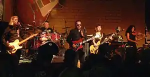 Tito & Tarantula performing 2016. L-R: Marcus Praed, Johnny "Vatos" Hernandez, Tito Larriva, Lolita Carroll Larriva, Allysa Grace