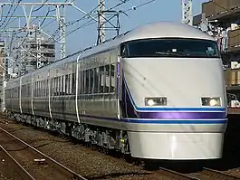 First refurbished set, 105, in "miyabi" purple livery, December 2011