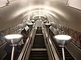 The escalators with uplighters at Tooting Bec