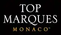 Top Marques Monaco logo, consisting of the event name in all-caps serif font, white text on black, with "Monaco" smaller and in gold