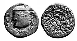 Silver coin of Toramana in Western Gupta style, with the Gupta peacock and Brahmi legend on the reverse. Similar to the silver coin type of Skandagupta. On the obverse the date "52" is also inscribed. A modern Image:.