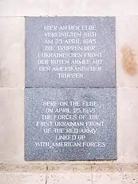 A commemorative plaque now stands where the "East Meets West" moment took place in Torgau on Elbe Day, 1945