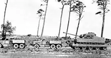 Two Diamond T tractors towing a Tortoise heavy tank, 1948.