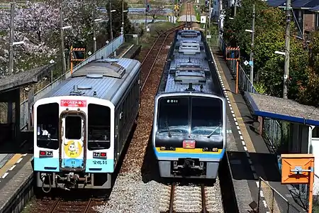 The picture of the Donman mascot is on the front of this Asa Line 9640 DMU to the left. The train is at Tosa-Otsu.