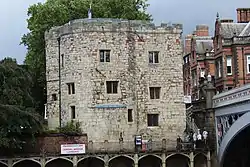 a square limestone tower