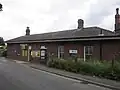 The station as viewed from the roadside drop-off point.