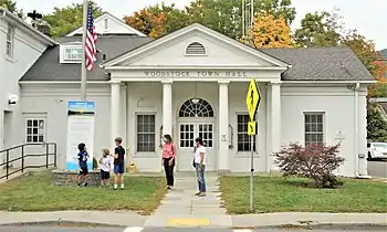 Town hall on Tinker Street (NY 212)