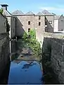 Perth Lade running beneath Lower City Mills, looking west (upstream), before it continues under Mill Street for the remaining 0.3 miles of its journey