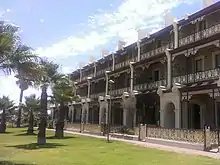 Marine Terraces, Grange Beach (1884). A key example of the Adelaide-style, with three storeys of setback filigree verandahs.