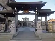 Komainu outside the gate of Saikouji in Toyohashi