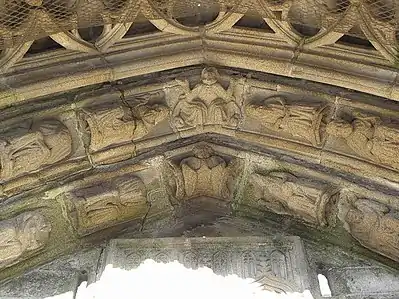 Another view of the voussoirs decorating the arch of the "porche des cloches".