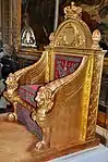 Empire throne; by Bernard Poyet and François-Honoré-Georges Jacob-Desmalter; 1805; carved and gilded wood, covered in red velvet with silver embroidery; 160 x 110 x 82 cm; Musée des Arts Décoratifs
