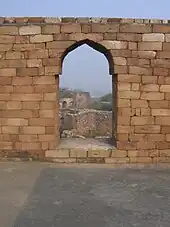 A corbelled arch typical of Hindu temples at the tomb, built in 1231 AD, before the true arch was introduced to India much later, at Balban's tomb ca 1287.