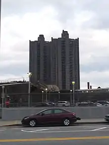 Tracey Towers from West 205th Street.  Entrance to Jerome Yard is visible.