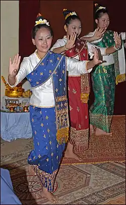 Image 29Lao Loum girls dancing in traditional sinh (from Culture of Laos)