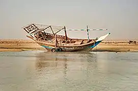 Traditional dhow on Al Mafjar beach