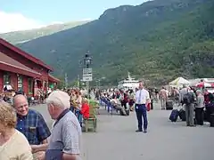 Tourists at the railway station in Flåm. The station has the village's only public toilets