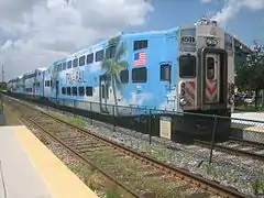 Tri-Rail cab car 501 departing Deerfield Beach