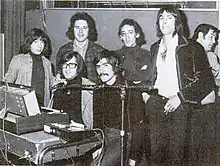 Triana in the recording studio of their debut album. Tele (left), Jesús de la Rosa (mid, sitting) and Eduardo Rodríguez (right, smiling)