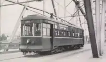 Tram on the Frank J. Woods Bridge