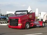 A former Scania T 500 test truck, converted by Sven-Erik "Svempa" Bergendahl into a roadster, fitted with a twin-turbo and named the R 999 "Red Pearl".