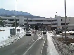 Mainline toll plaza ahead of tunnel portal and administrative building