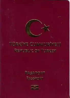 cover of Turkish passport (maroon with gold letters)