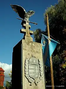 Turul statue on war memorial, Csíkszentmárton (now Sânmartin), Transylvania, Romania (1941)