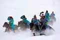 Tuvan horse-riders wearing deel.