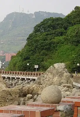 A mountain looms over a school building