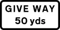 Plate used with "GIVE WAY" triangle to give the distance to GIVE WAY line