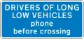 Information sign for large vehicles informing to phone at automatic level crossing