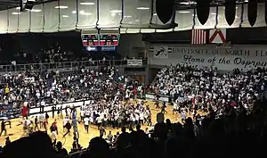 Fans storm the court after UNF defeated rival JU in 2014