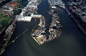 View is downriver facing northeast. The locks are at far left.