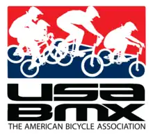 USA BMX logo, with four cyclists on a red-and-blue background