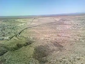 Image 3In this photo, the Mexico–United States border divides Sunland Park and the Mexican state of Chihuahua. (from New Mexico)