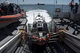 USCG long range interceptor using the stern launching ramp of the USCGC Bertholf.