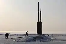 Alexandria submerged after surfacing through 2 ft (60 cm) of ice during ICEX-07, a joint U.S. Navy/Royal Navy exercise.