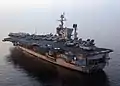 Stern view of the port side of John F. Kennedy showing the elevator and self-defense AAW equipment.
