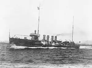 USS Tucker (DD-57), underway while running trials, circa 19 March 1916. Note the ice accumulated amidships.